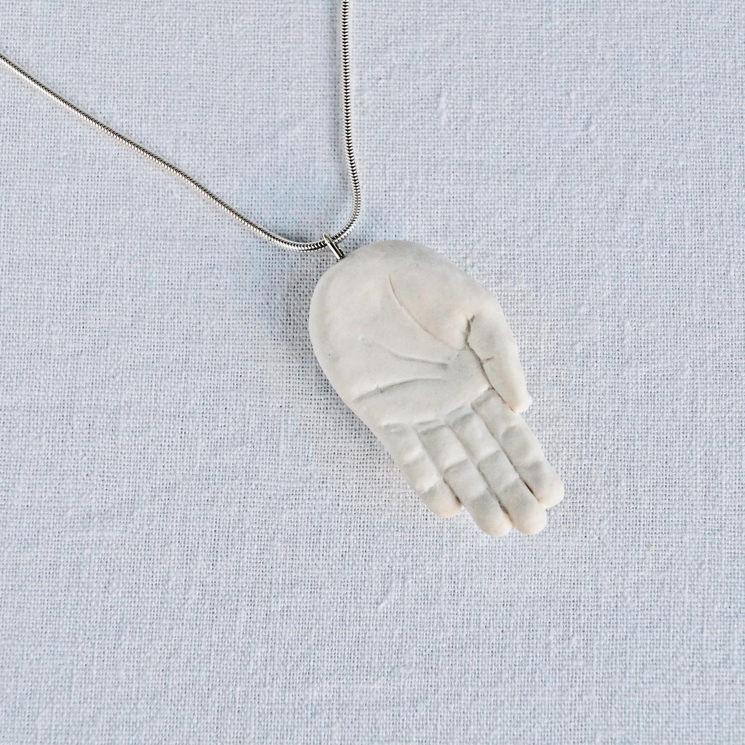 White porcelain hand necklace, hand jewellery, sculpted hand, platinum lustre nails, craft worker gift, white porcelain gift, 18th wedding anniversary, birthday gift, 925 sterling silver, snake chain, omega necklet, 18th anniversary gift for women, 18th anniversary porcelain jewellery, 18th anniversary porcelain necklace, first anniversary paper, 1st paper gift, Valentines day gift, 18th anniversary porcelain necklace, UK, native american hand peace sign,