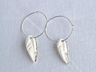 White feather and silver hoop earrings